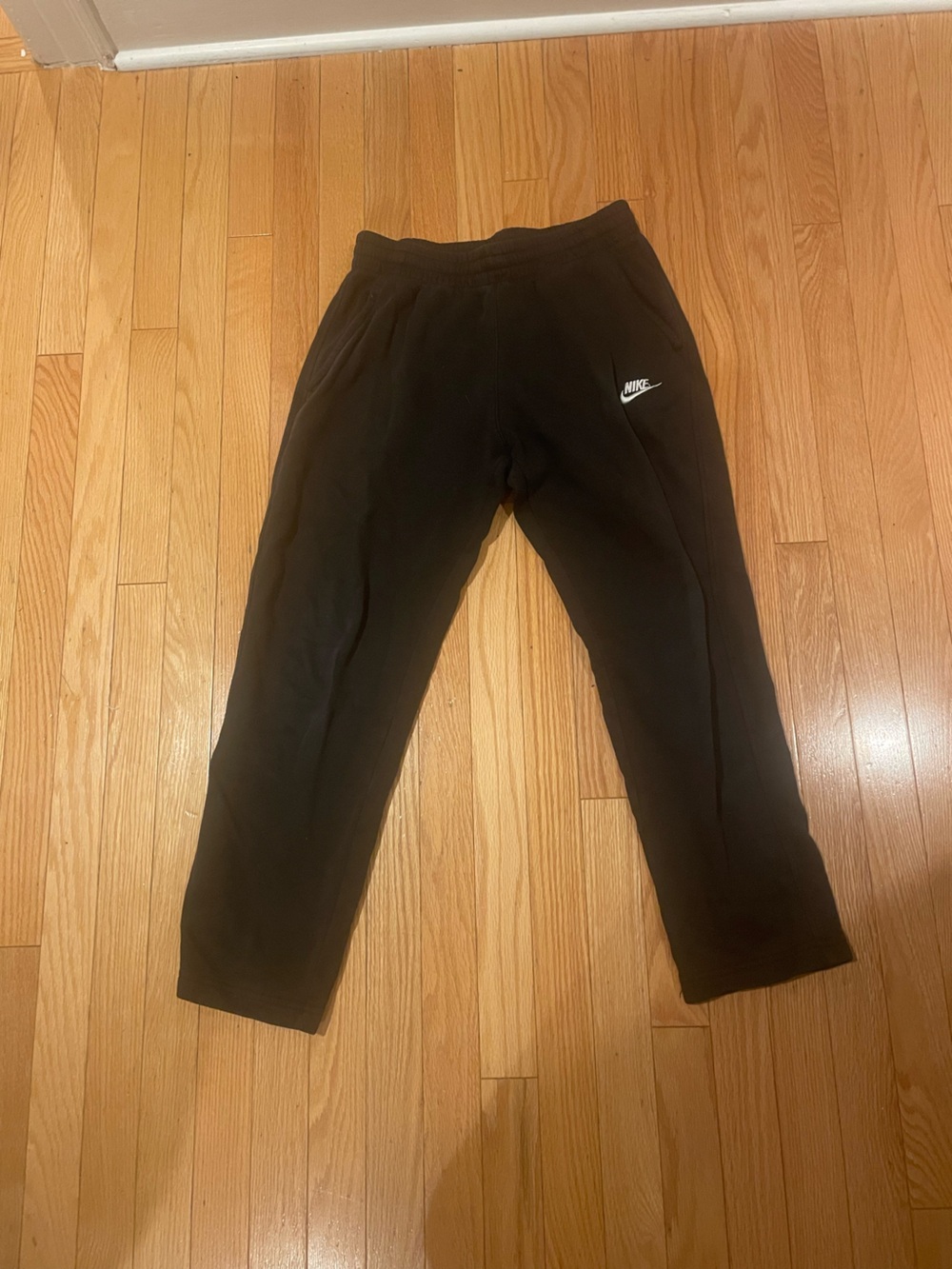 Nike Kids Black Sweatpants with White Swoosh Logo